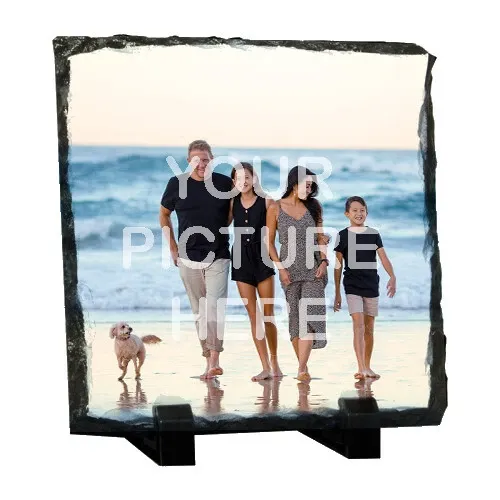 A personalised slate photo frame showing a family walking on a beach